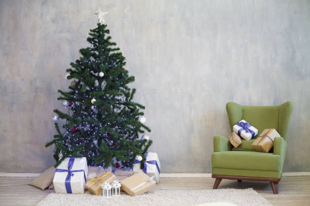 istock Christmas tree with presents home for the new year 867733276