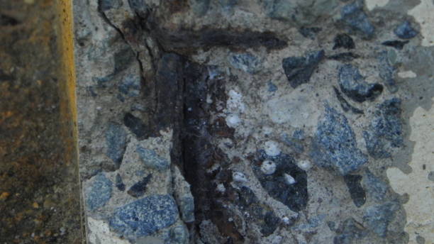 istock rusty steel showing on a broken reinforced concrete beam 867736724