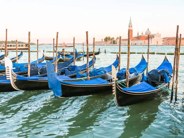 istock Gondolas moored in the Venetian lagoon 867742728