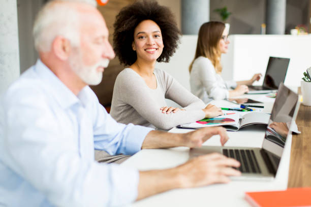 istock Business people discussing a strategy and working together in office 867745356