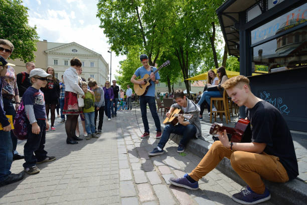 Vilnius, Lithuania - May 17: Unidentified musician play guitar in Street music day on May 17, 2014 in Vilnius. Its a most popular event on May in Vilnius, Lithuania
