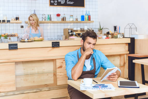 istock serious small business owner 867747770