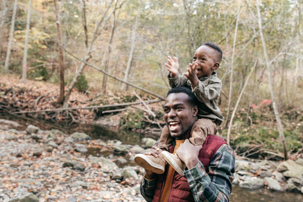 istock BEst dad holding son on  shoulders 867754288