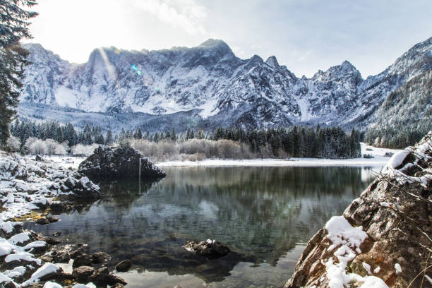istock first snow at the mountain lake 867767456