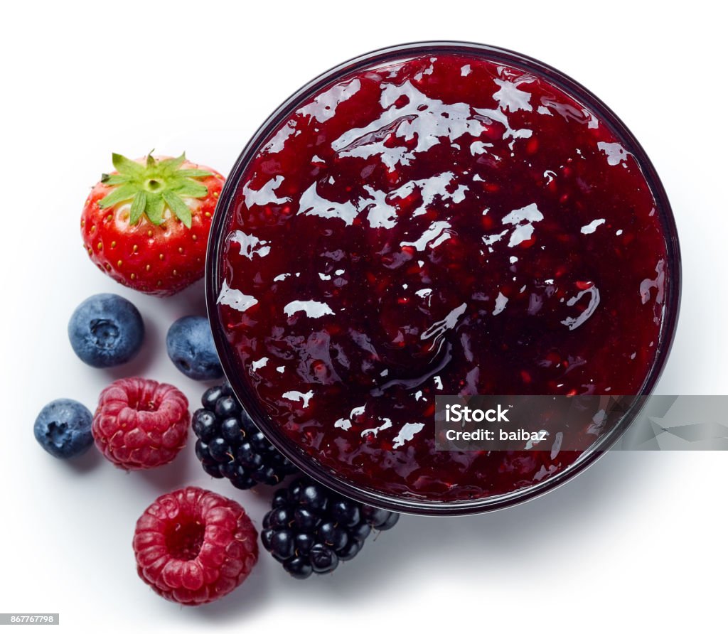 Bowl of wild berry jam Bowl of wild berry jam isolated on white background from top view Preserves Stock Photo