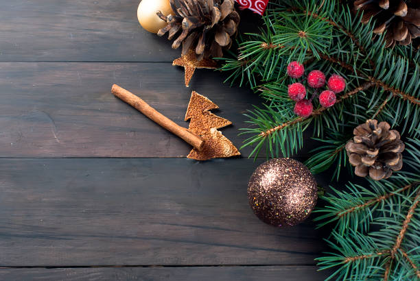 istock Gift box tied with a red ribbon , fir branches,candy 867767922