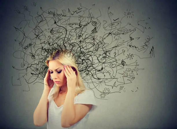 Photo of Thoughtful blonde woman with a mess in her head