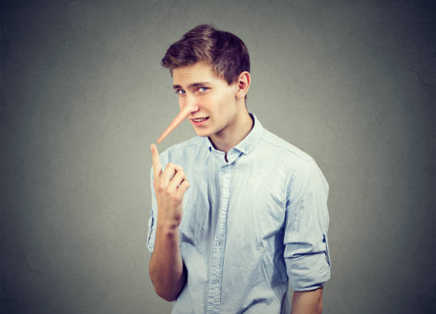 istock Man with long nose isolated on gray wall background. Liar concept. Human emotions, feelings. 867774070