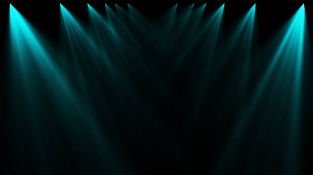 istock green spotlights lighting flare on a dark background, abstract 867774144