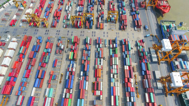 istock Logistics and transportation of Container Cargo ship and Cargo working crane bridge in shipyard 867774748