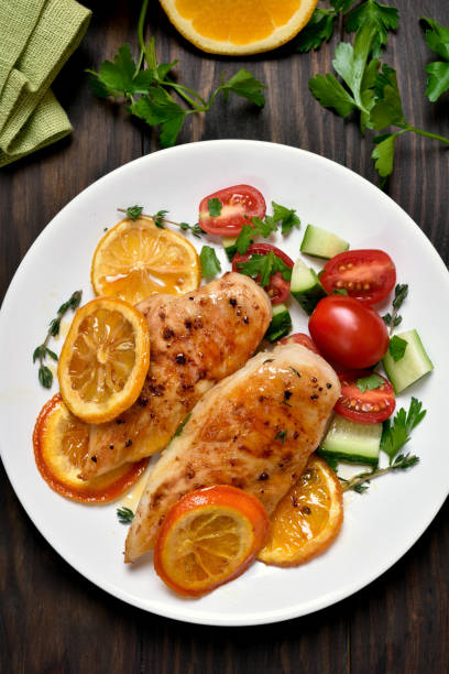 istock Cooked chicken breast with orange sauce 867792102