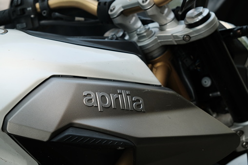 Berlin, Germany - August 2, 2017: Aprilia logo. Aprilia is an Italian motorcycle company, owned by Piaggio. Started as manufacturer of bicycles it moved on to scooters and small-capacity motorcycles