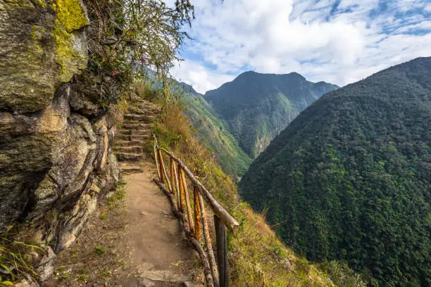 Photo of Inca Trail, Peru - August 03, 2017: Wild landscape of the Inca Trail, Peru