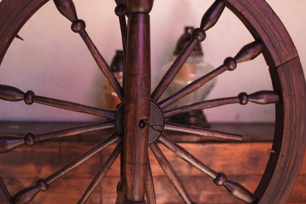 istock Close up of an old brown spinning wheel 867799316