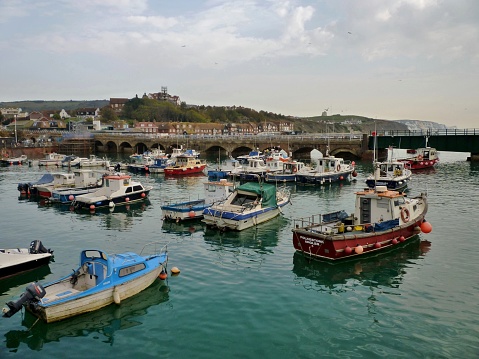 Folkestone, England - October 16, 2107: the harbour in Folkestone, on the south coast, includes both fishing boats and pleasure craft.