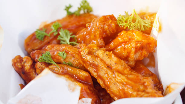 istock Hot chili chicken wings american pub dish 867820796