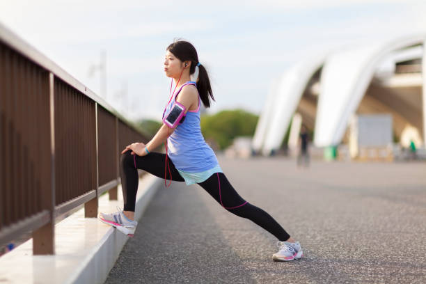 istock Sports Woman Stretching Her Legs 867836156