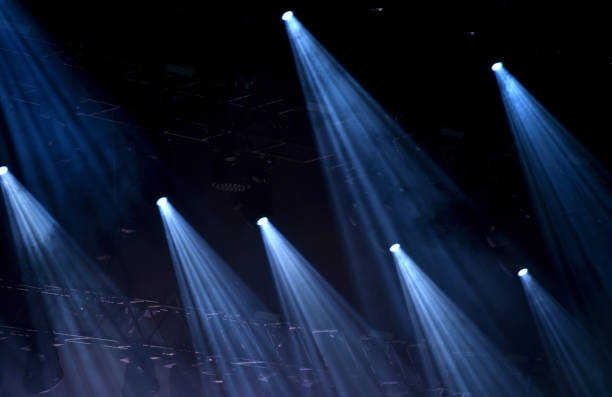 istock Blue stage lights, light show at concert 867852040