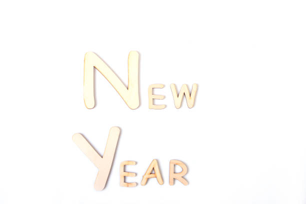 istock New year Holiday Greetings Card on white board table 867852060