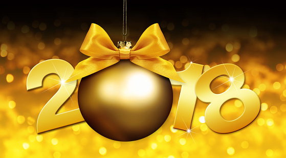 happy new year christmas ball with golden ribbon bow and 2018 text on golden blurred lights background