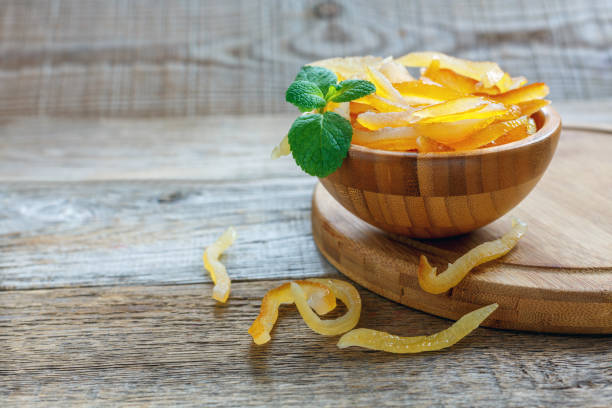 istock Bowl with mint and candied orange. 867856452