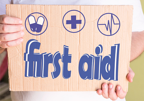 first aid concept, on cardboard