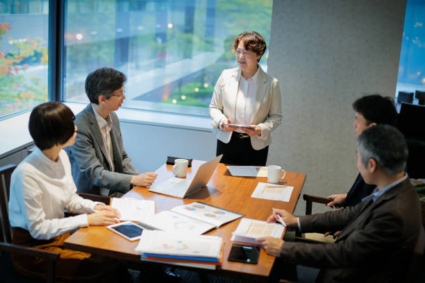 istock Business women at a table having a meeting 867863072