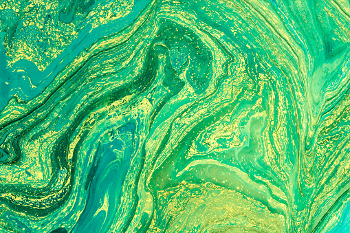 Blue marbling texture. Creative background with abstract oil painted waves handmade surface. Liquid paint.