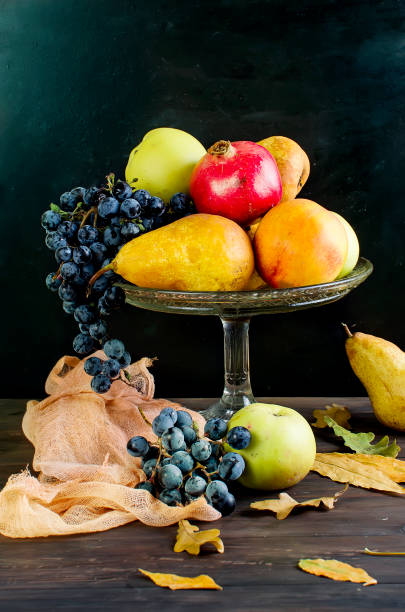 istock Fresh autumn fruits - pomegranate, pears, grapes and apples 867882106