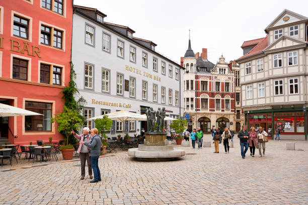 Quedlinburg, Germany – September 07, 2017: Tourists on the historic market square in the old town of Quedlinburg in the Harz