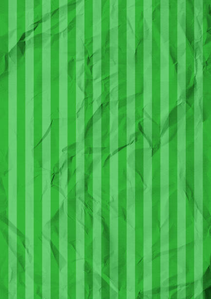 istock Green folded striped vertical paper. 867903212