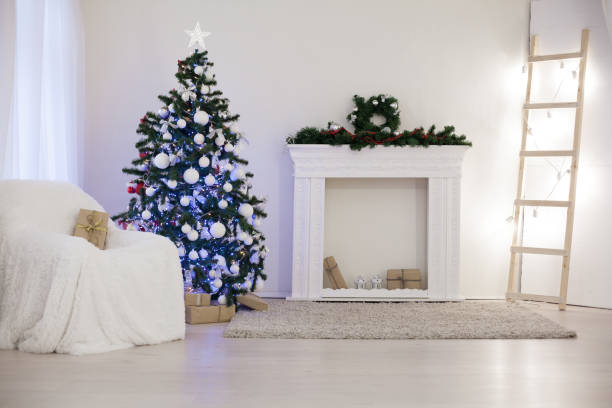 istock Christmas tree in a white room with Gifts Christmas Decor 867903526