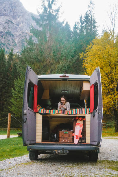 istock Woman in the camper van in Austrian  mountains 867903848