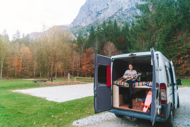 istock Woman in the camper van in Austrian  mountains 867906294