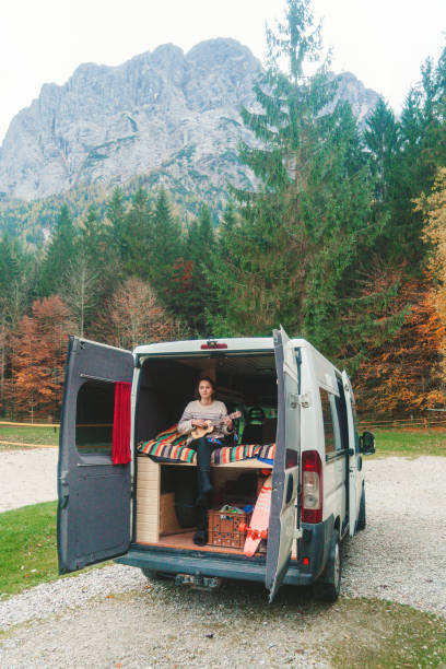 istock Woman in the camper van in Austrian  mountains 867906296