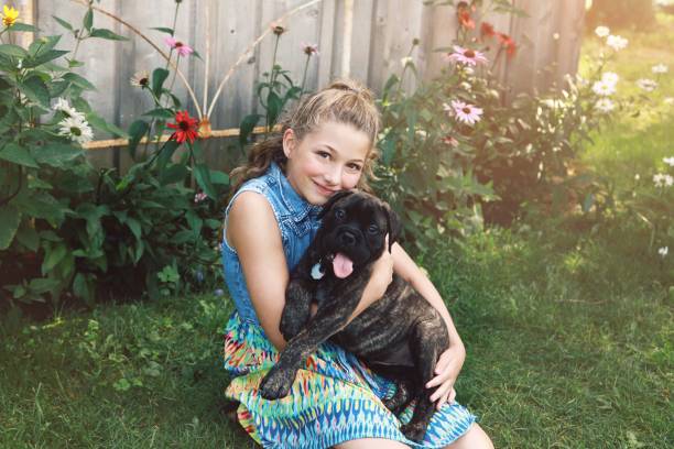 istock Little Girl With Puppy 867906450
