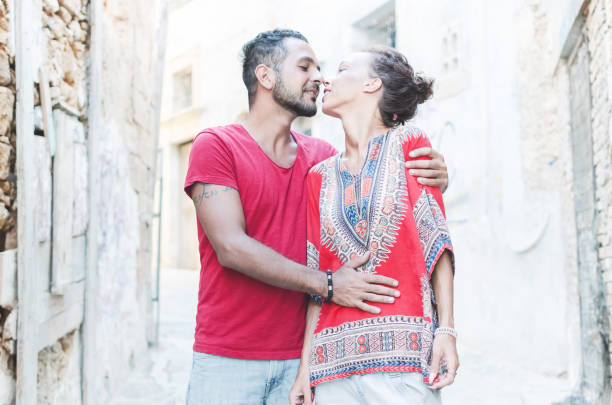 istock Indian couple kissing and hugging each other 867909318