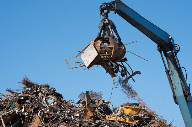 istock Scrap metal trash for recycling. Claw Grabber Crane 867922012