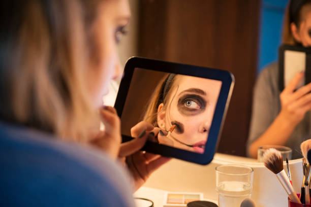 istock Close-up on young woman's eye with heavy makeup 867922816