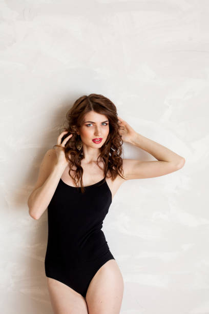 istock girl in lingerie posing in the Studio 867928724