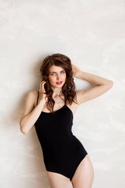 istock girl in lingerie posing in the Studio 867928766