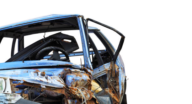 istock Broken passenger car after the collision. Road accident, isolate on a white background. The wreckage of the blue car. Front view.  Broken machine hood, protruding wires and machine parts 867928940