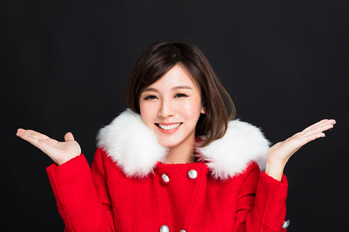 Happy young woman in winter clothes