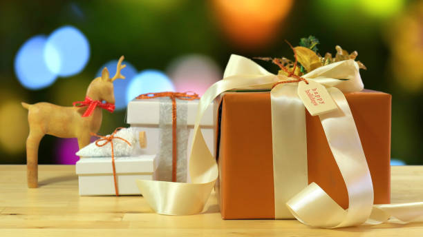 istock Modern gold, copper and white wrapped Christmas gift 867929938