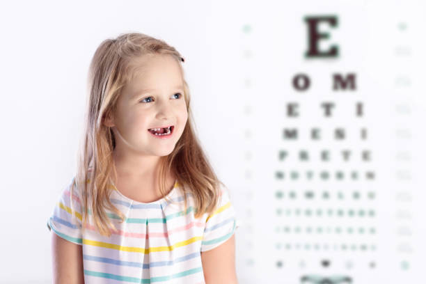 istock Child at eye sight test. Kid at optitian. Eyewear for kids. 867942080