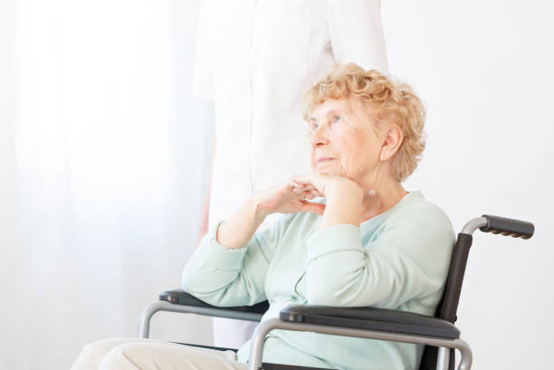 istock Sad pensioner in wheelchair 867944760