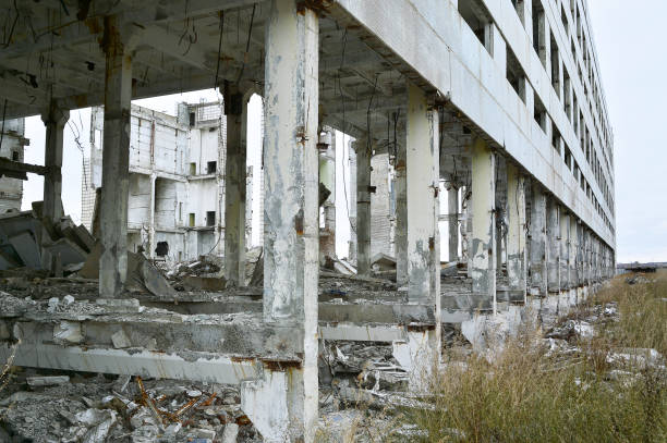 istock Remains of the destroyed industrial building 867947480