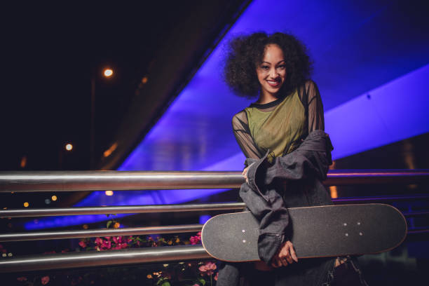istock Pretty woman with skateboard 867951254