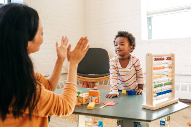 istock Parent playing with toddler 867956946