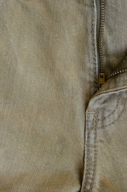istock Texture of Brown Denim Jeans. 867969418